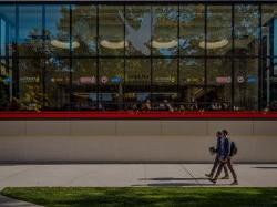 Students walking by the outside of the Student Center.